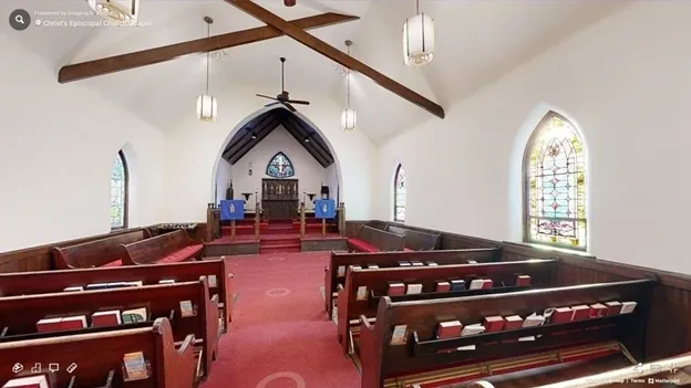 A church with pews and chairs in it